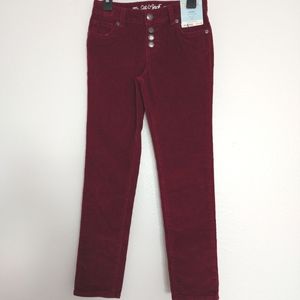 Girls stretch corduroys.